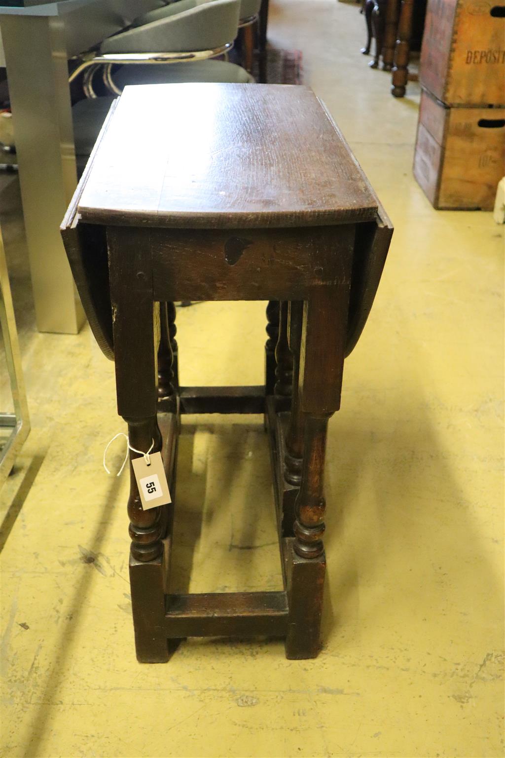 A small oak gateleg table, width 65cm, depth 34cm, height 66cm